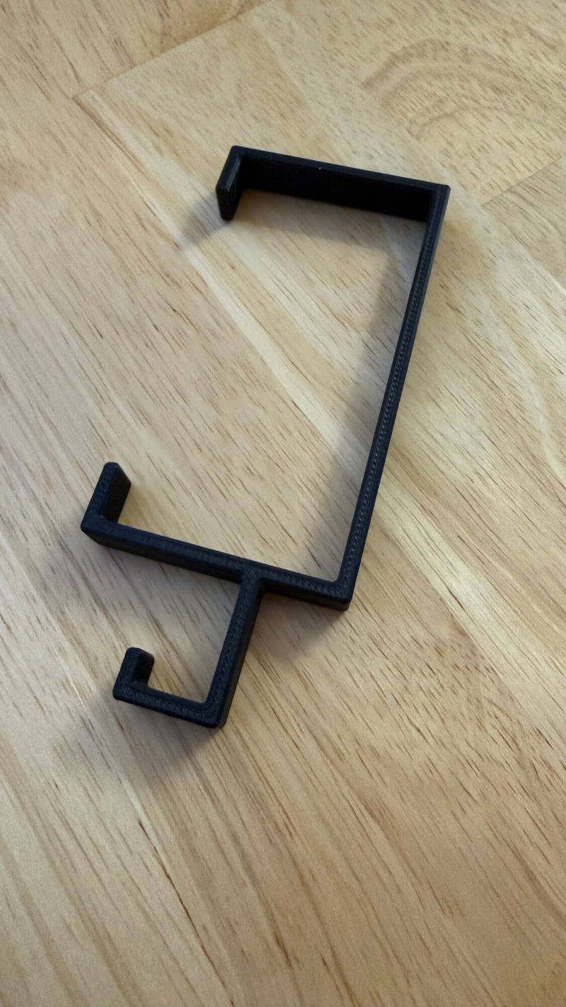 The final version of the plastic bracket that is used to hold the Hue Lightstrip to the bed frame